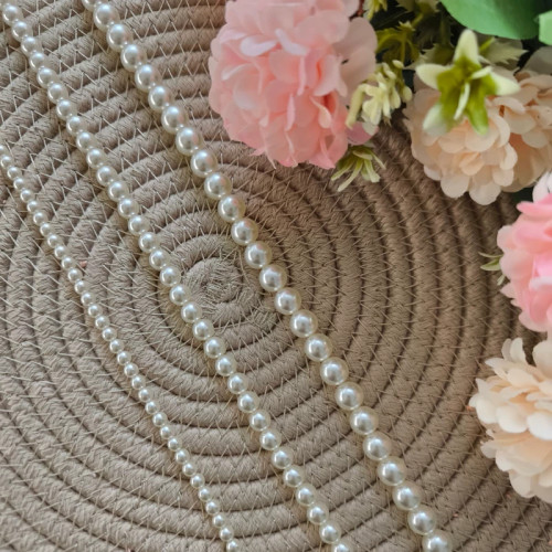 مروارید شل رنگ شیری(فروش بصورت یک ریسه میباشد)