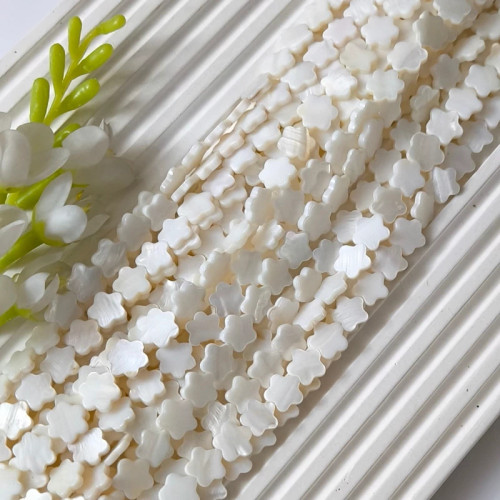 سنگ صدف اصل طرح گل 12 میلی (فروش بصورت ریسه ای شامل 30 مهره)