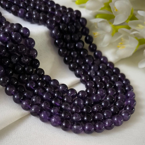 سنگ آمیتیست سایز 8 (فروش محصول بصورت ریسه ای میباشد)