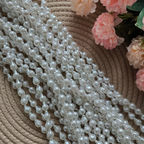 مهره طرح باروک دفرمه (طول ریسه اش 85 سانتی و شامل 80 دانه مهره)